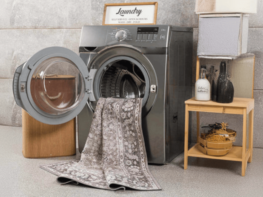 Washable Area Rug on a laundry day next to a washing machine.