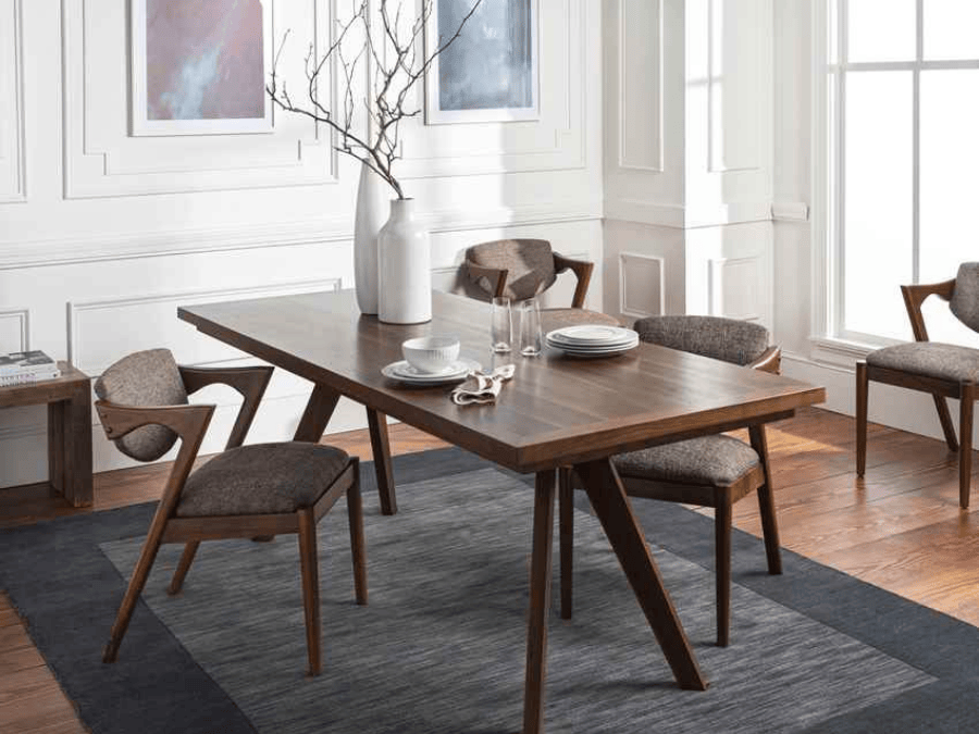 black and gray rug is placed under the table.