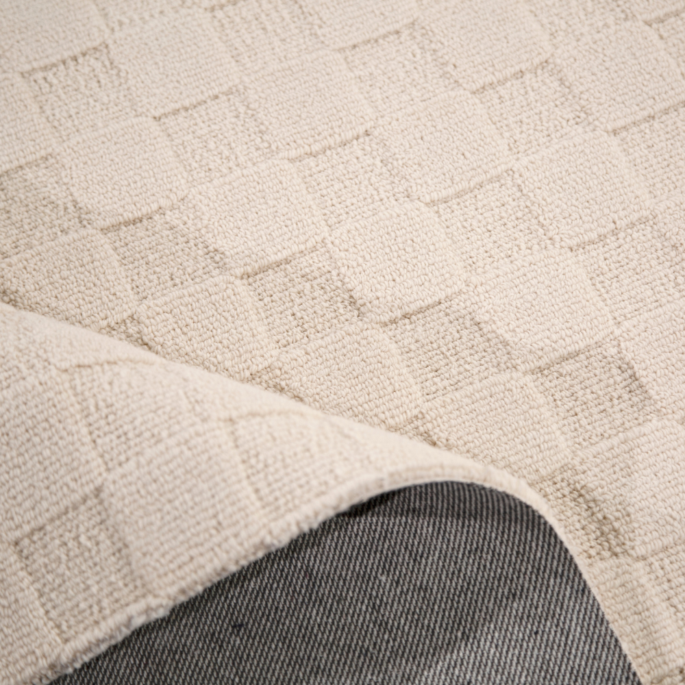 Textured cream washable rug ideal for stylish home interiors.