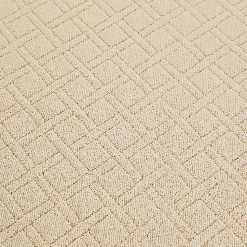 Light beige geometric woven rug, perfect for stylish home interiors.