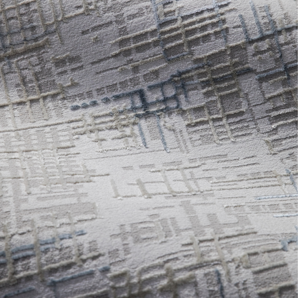 Velvet Reverie Stripes rug close-up in gray and beige with textured abstract pattern.