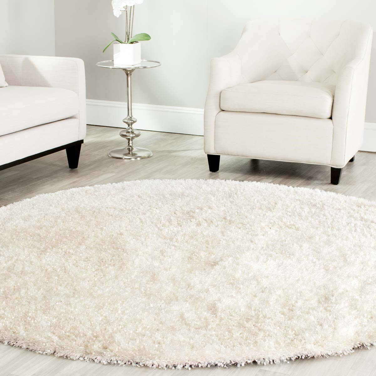 Elegant round light cream Shimmering Dream Shag Rug for modern home decor.