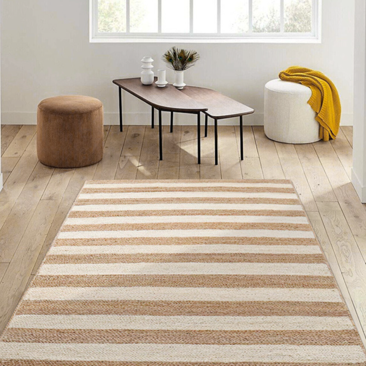 Beige and cream striped Sandy Shores outdoor rug enhancing a modern living room.