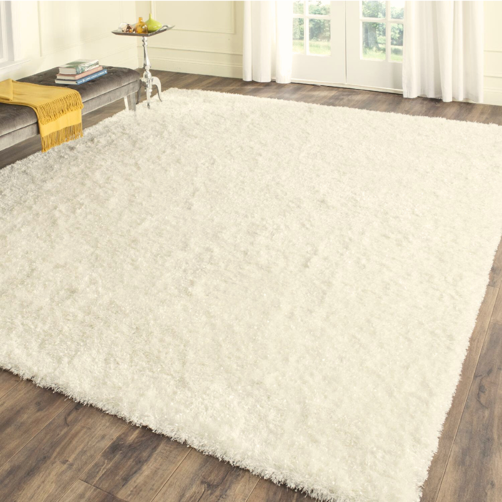 Light cream Shimmering Dream Shag Rug enhancing elegant home decor.