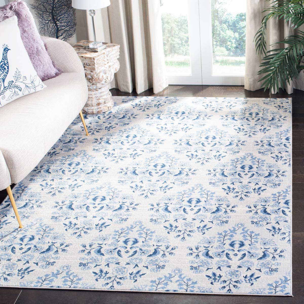 Floral patterned rug in blue and white, perfect for elegant home interiors.