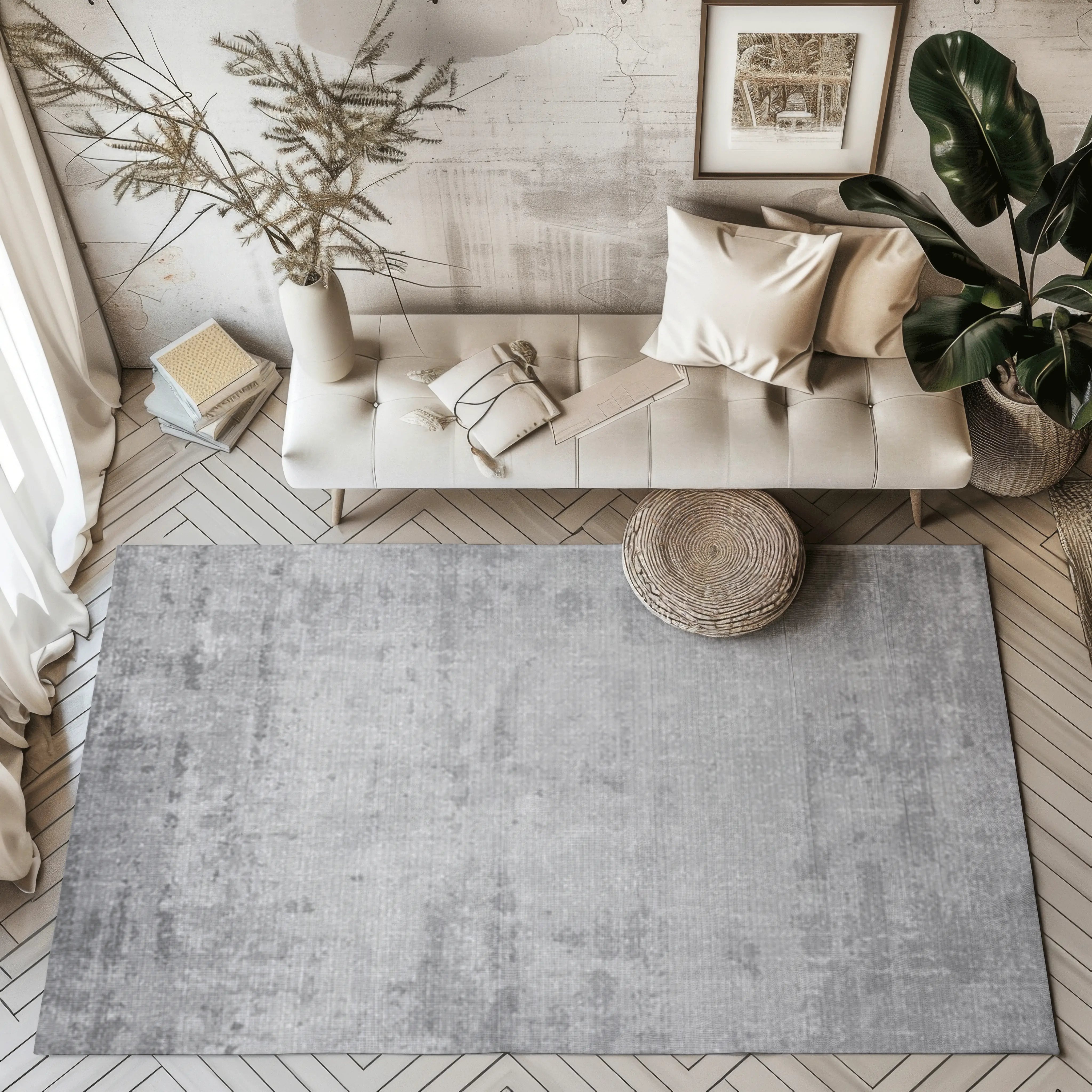 Modern living room with a distressed gray rug and minimalist decor