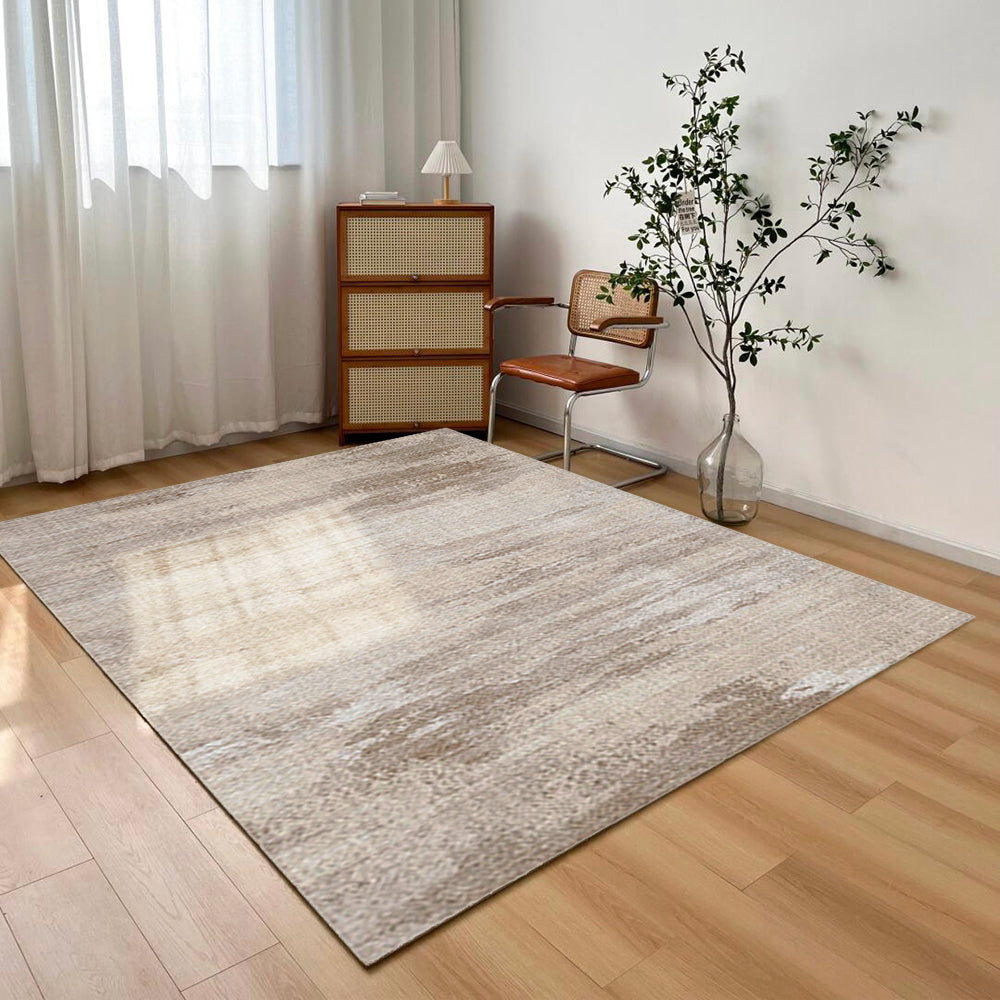 Dawn Mist Modern Rug showcasing light neutral tones and subtle striations in a room setting.