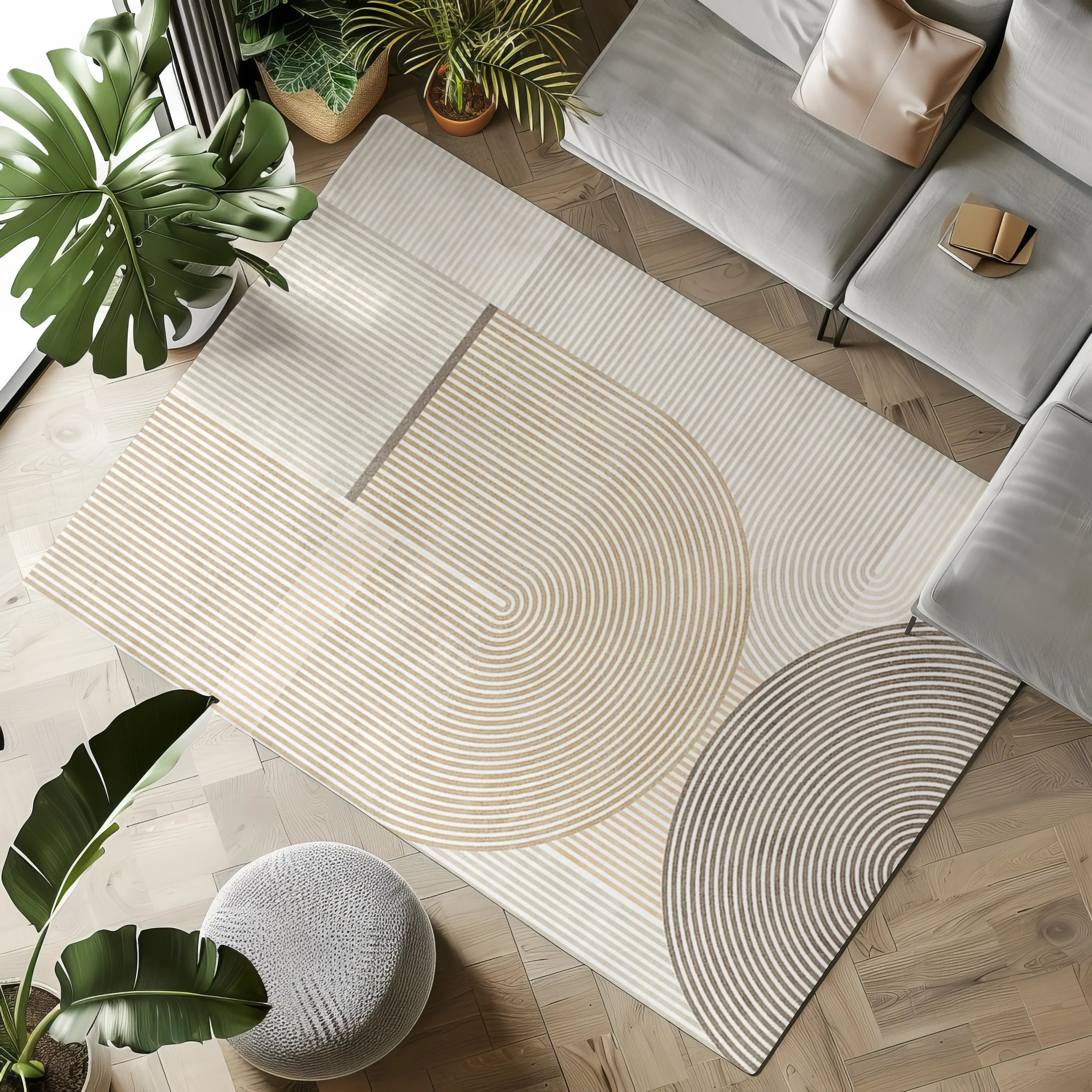 Zen Ripples geometric rug with curved lines in a stylish living room with plants.