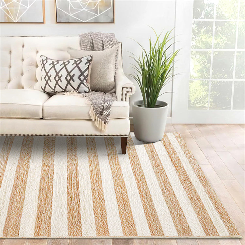 Beige and cream striped Sandy Shores Outdoor rug in a stylish living room.