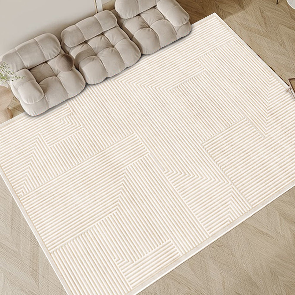 Ivory labyrinth stripe rug under cozy sofas, enhancing modern living space decor.