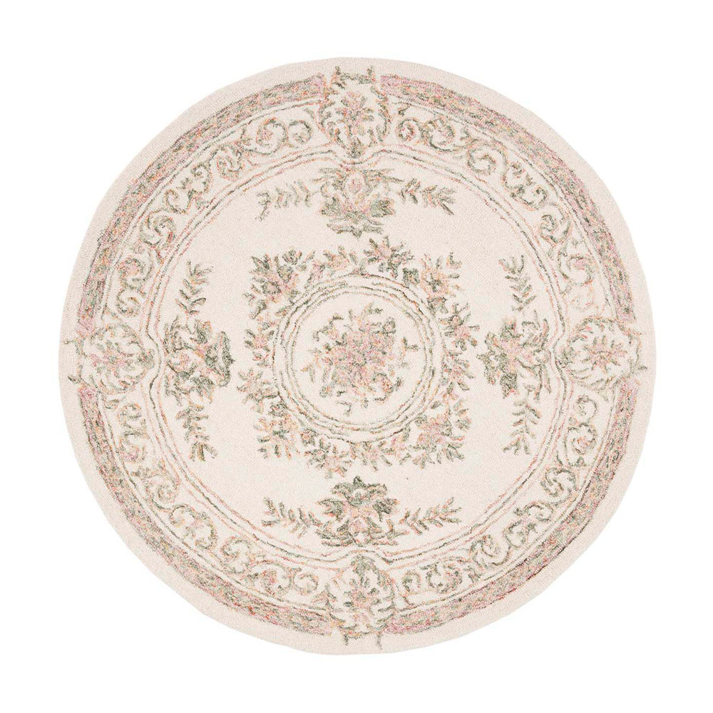 Round floral design Timeless Reflection rug in soft colors for elegant home decor.