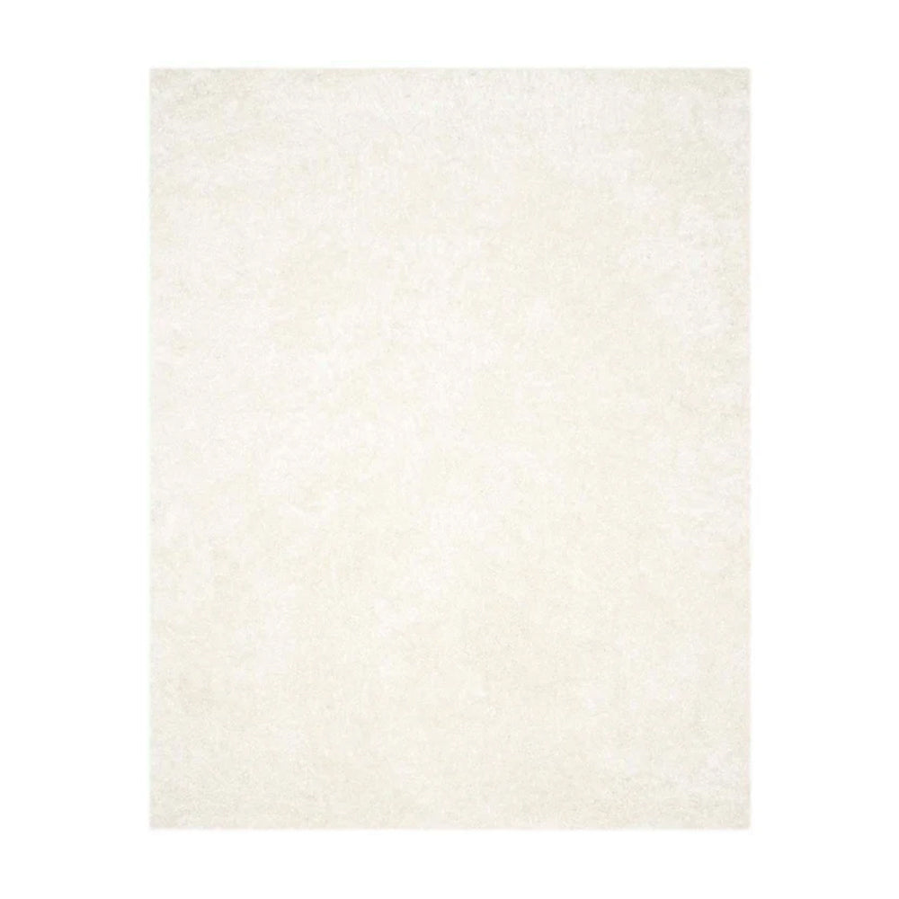 Shimmering Dream Shag Rug in light cream color, perfect for elegant living spaces.