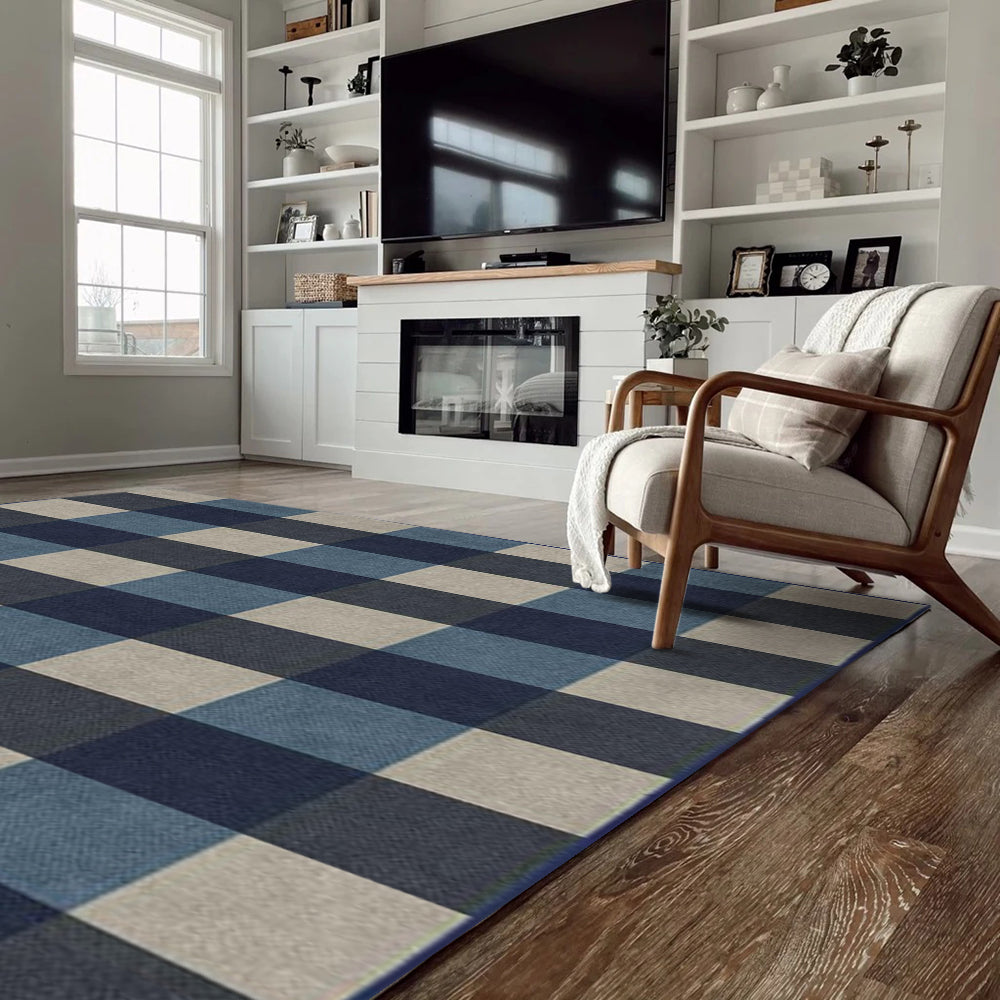 Cozy living room with Nerina checkered rug in navy blue and beige.