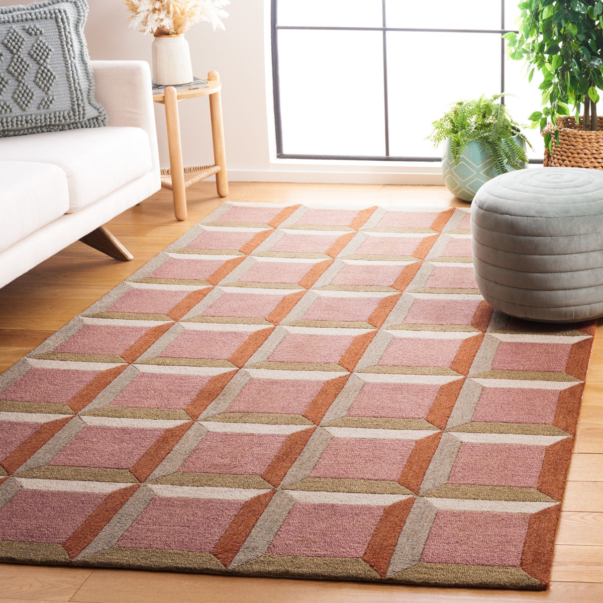 Peach and beige geometric rug design for stylish home interiors.