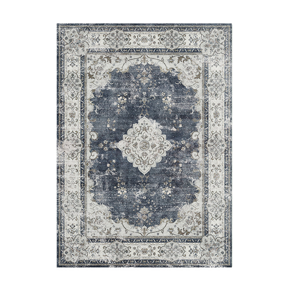 Sunny Grove vintage rug in navy blue and cream with floral patterns