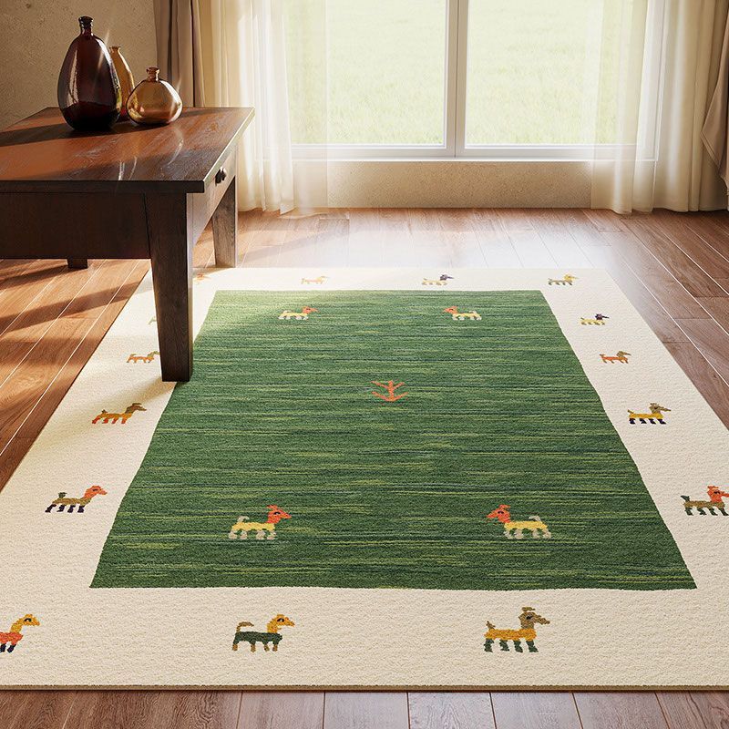 Colorful horse patterned rug on green background in a cozy living room.