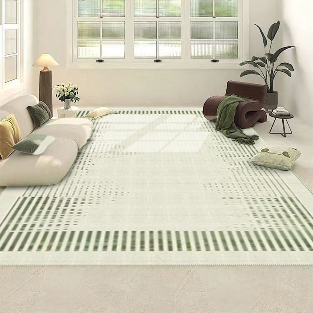 Modern green and cream striped rug in a bright living room setting