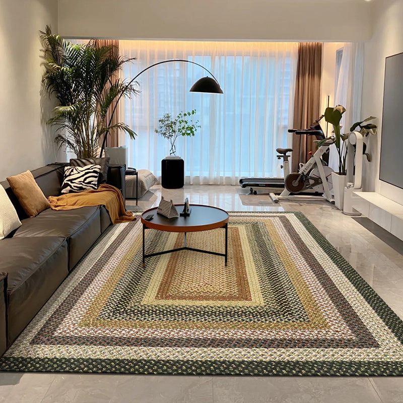 Faith Bohemian woven rug in warm geometric pattern, enhancing stylish living room decor.