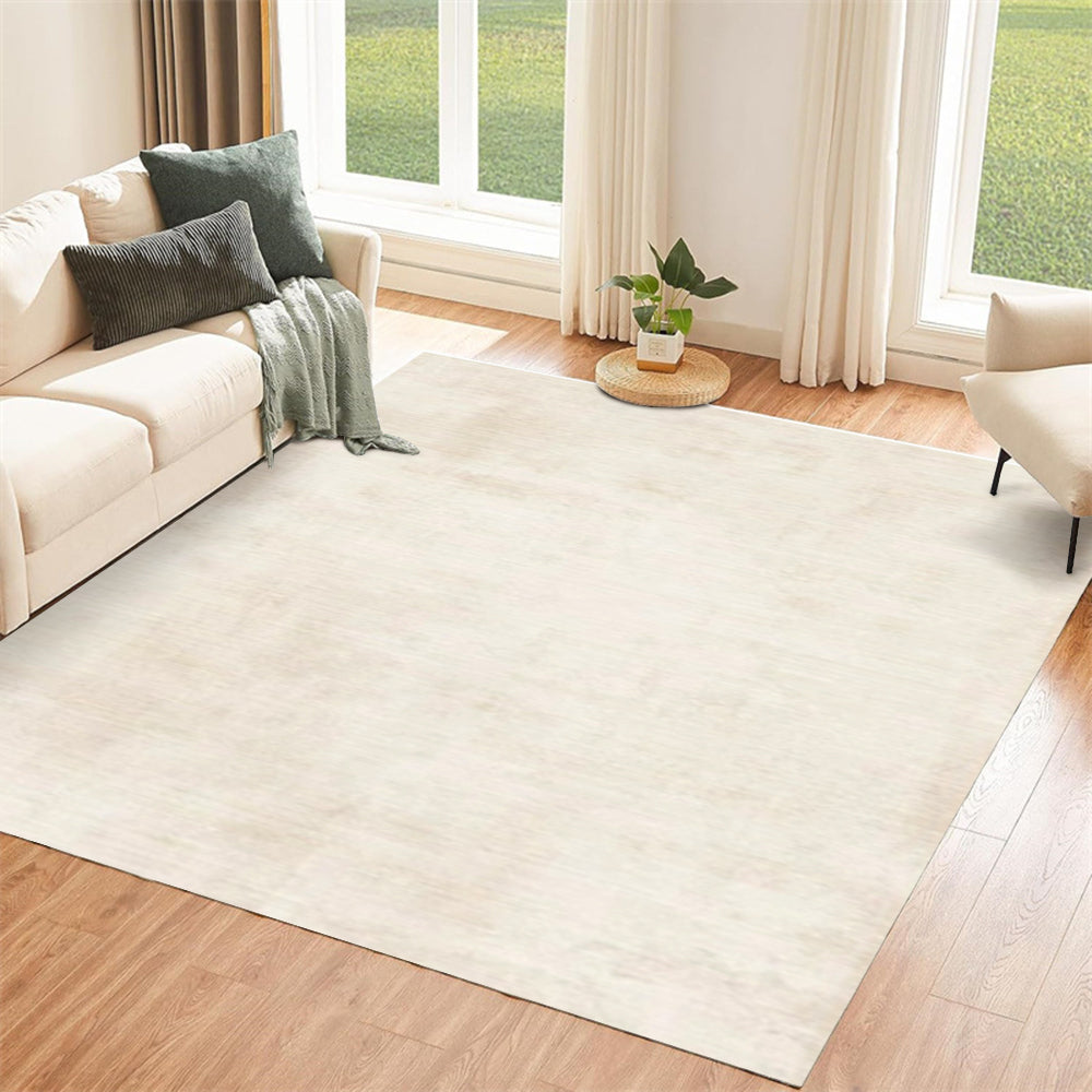 Spacious living room with Shimmering Tide White Rug on hardwood floor and natural light