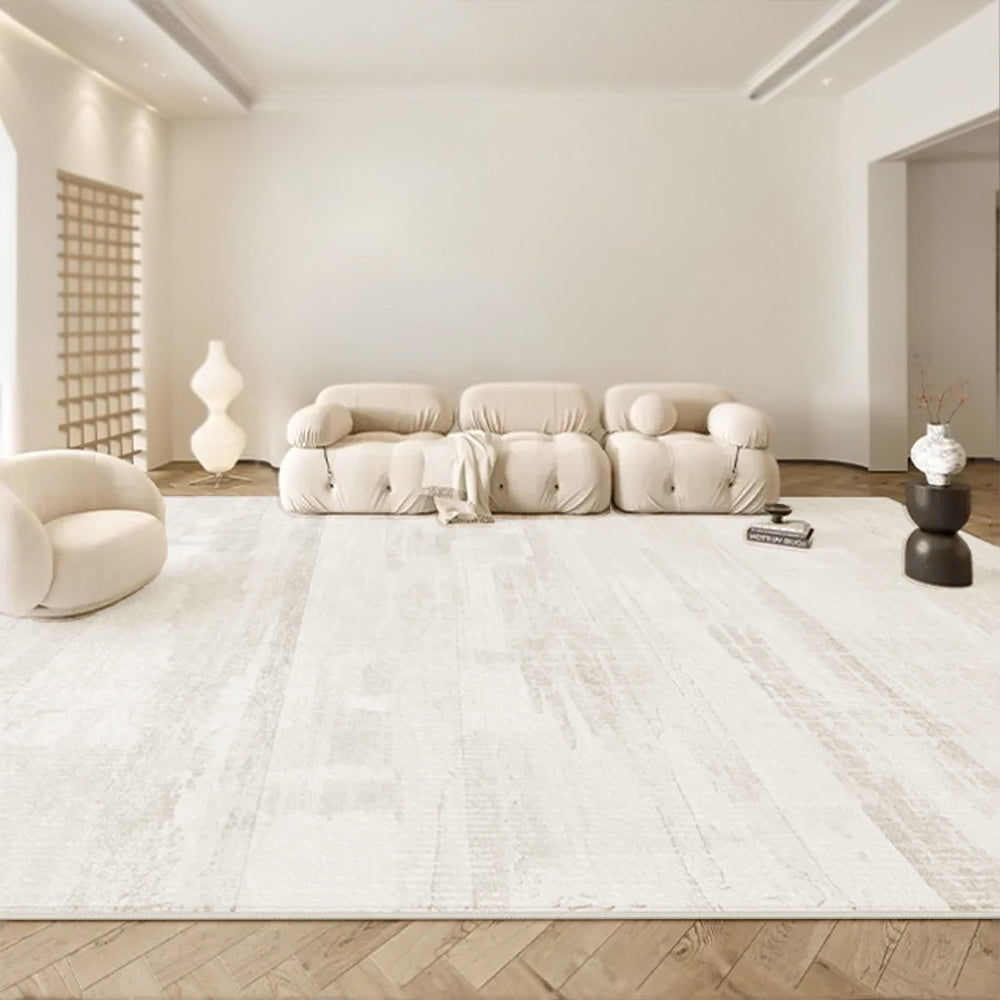 Light-toned Majestic Reflection modern rug in a minimalist living room with abstract design.