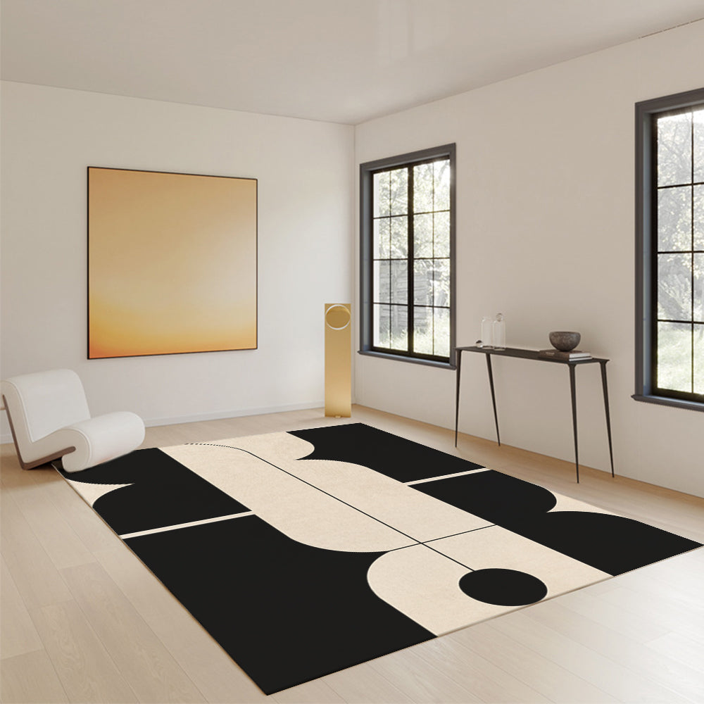 Lighthouse Geometry Stria rug in abstract black and cream pattern in a contemporary room