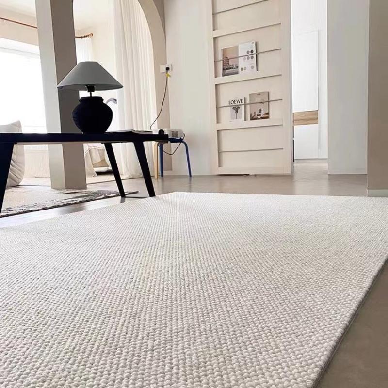 Light beige woven rug from Timeless Symphony Seren Collection in a stylish living room.