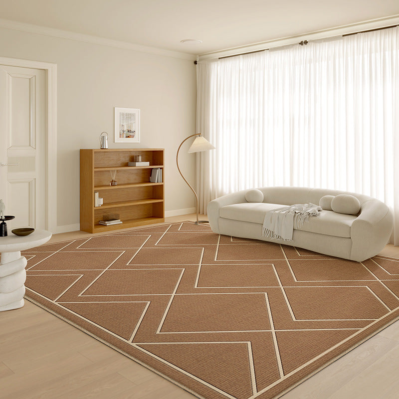 Warm brown geometric rug with diamond patterns in modern living room