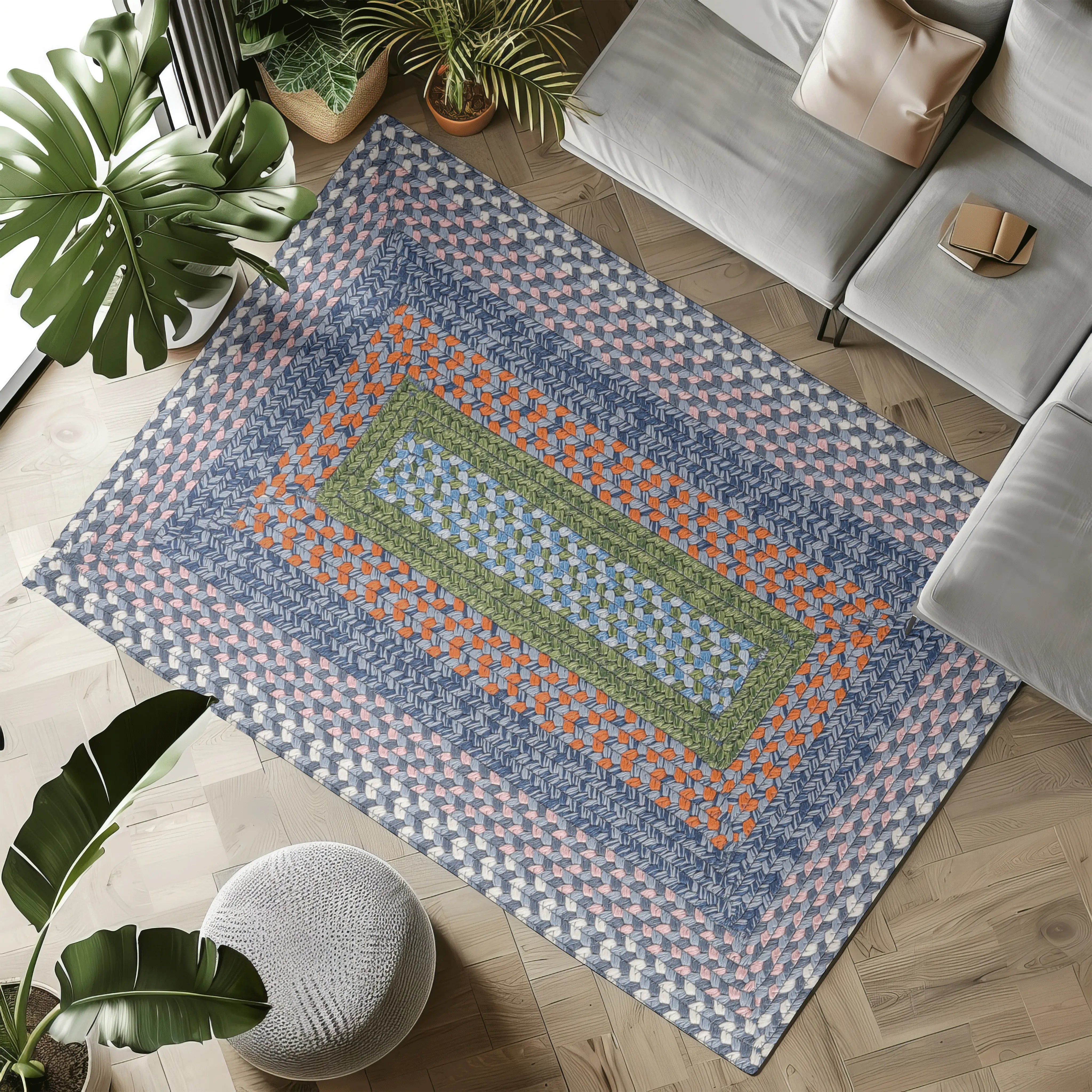 Multicolored braided Starlit Horizon Stria outdoor rug on living room floor